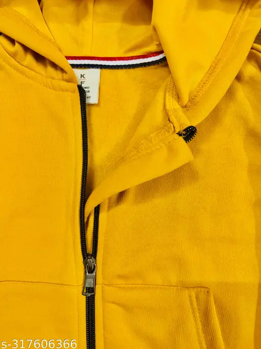 A yellow hoodie with a red and blue striped collar