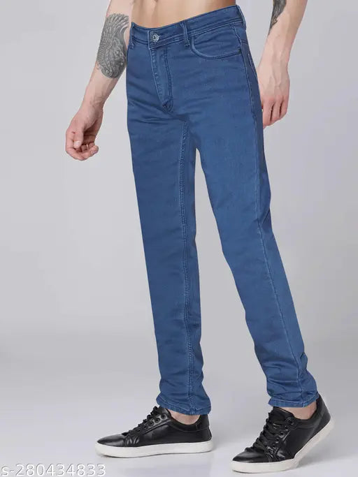 High-quality black denim jeans for men with light blue wash, featuring stylish details like rips and patches. Slim fit, stretchable and durable, available in sizes 30, 36, 38, and 46 (waist 30, 36, 38, 46; length 42 in). Made in India