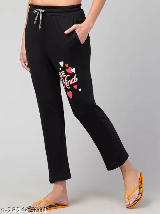 Black cotton pajama with waist tie and heart appliqué on leg