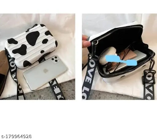 Black leather women's sling crossbody bag with adjustable strap