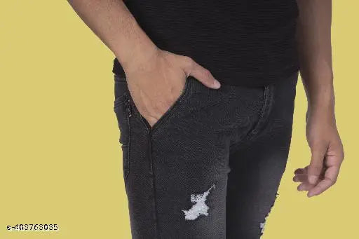 Mens black denim ripped jeans for unapologetic style, size 30/40 inches, Indian-made affordable jeans on display
