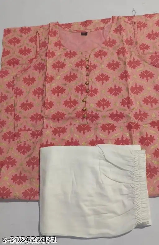 Peach-colored rayon kurti and palazzo set, printed net design on display, single size available