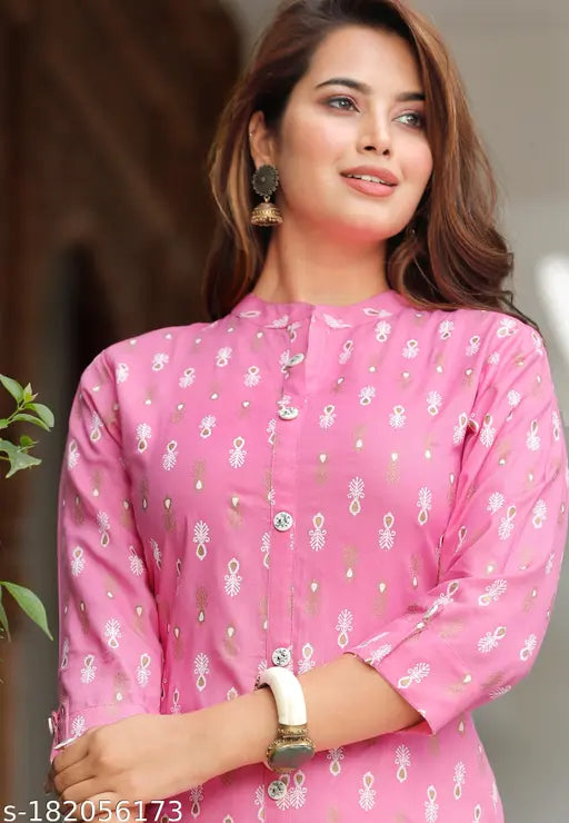Rayon printed kurta set with palazzos, featuring pink, baby pink, sky blue and beige design, three-quarter sleeves, round neck, side slits. Indian rayon fashion for women