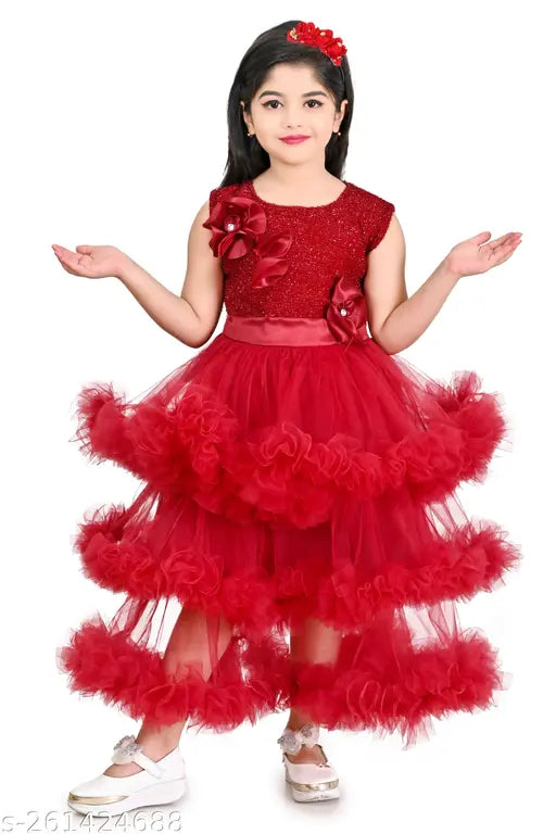 Red tulle dress with ruffles and flower appliqués, long sleeves, knee-length