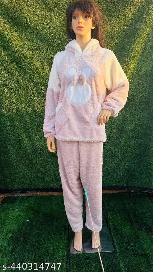 Warm woolen hood nightsuit with rabbit prints for women, suitable for winter casual outings. Soft fur lining for added warmth. One-size-fits-all pyjama with pockets. Imported from China