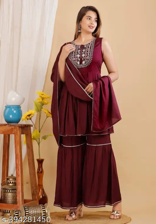 Maroon rayon kurta and dupatta set, with sharara and ruffled hem details
