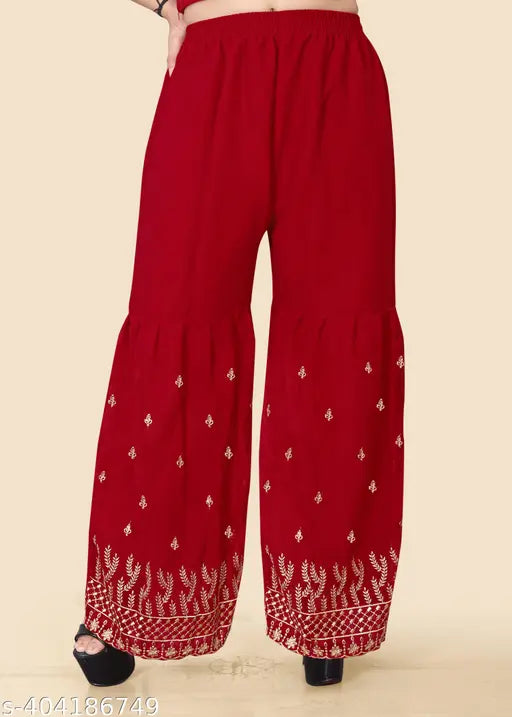 Red embroidered kurta and matching sharara and dupatta set