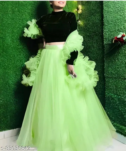 Green velvet and net Lehenga Choli set, featuring a solid-colored choli with a ruffled dupatta, semi-stitched for a custom fit (Lehenga waist size: 44 in, Lehenga length size: 48 in). Pista color