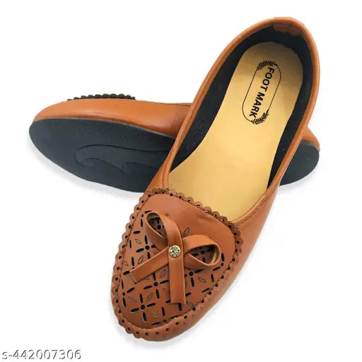 Stylish brown Mojri slip-ons with decorative stitching, featuring a bow at one side