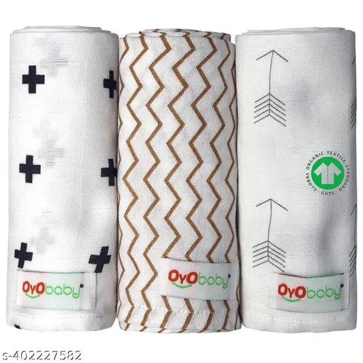 White pack of 3 OYO BABY swaddle wrap muslin cloths, organic cotton for babies, ultra-soft and breathable