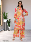 Cream and peach printed rayon co-ord set with three-quarter sleeves, featuring middle cut, mandarin collar, pockets in plazzzo, perfect for every occasion