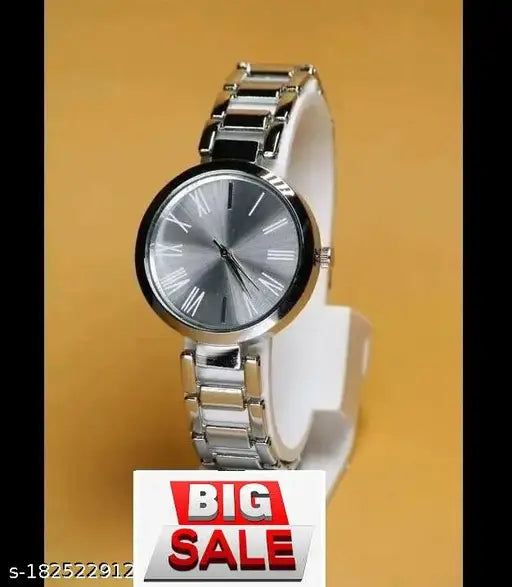 Stylish silver wrist watch with white face and black numbers