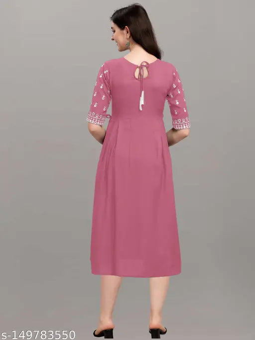 Embroidered rayon kurta in classic colors, three-quarter sleeves, suitable for casual or festive wear
