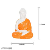 Handcrafted decorative showpiece statue of meditating Buddha. Orange hue on Lord Gautam Buddha figure, intricate details in traditional style