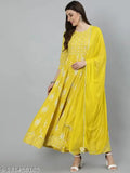 Yellow rayon anarkali gown with dupatta featuring ethnic motifs, Indian-inspired women's fashion on mannequin