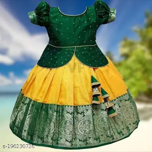 Soft silk kids lehenga choli with modern design, zari woven pattern, short sleeves, stitched net. Modern kidswear from India