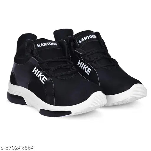Black sports shoes with white branding, lace-up design, and white soles