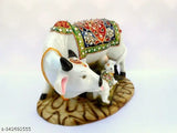 Multicolor resin Kamdhenu cow and calf statue, handcrafted from Rajasthan, 6-inch height for bedroom decor