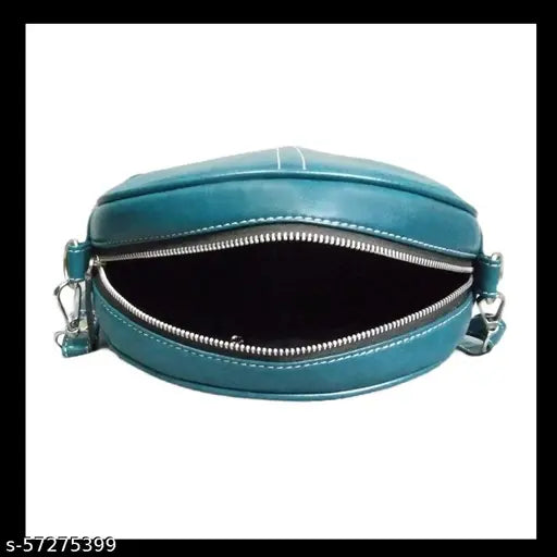 A woman's plush bag with zipper and sling strap, available in various colors