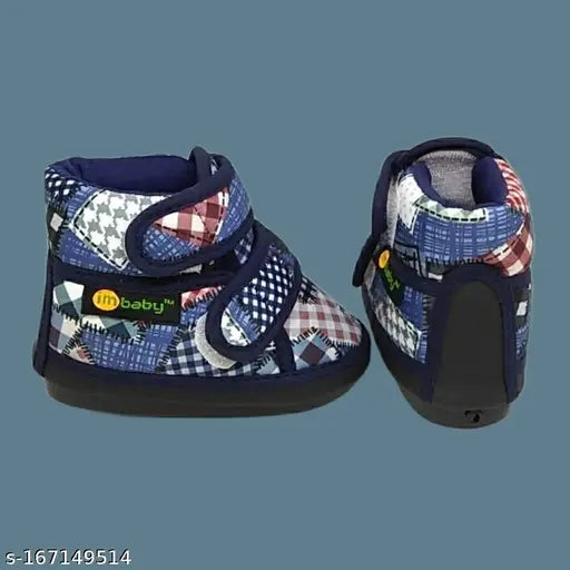 Bright blue, white, and black plaid velcro baby shoes with a patterned sole
