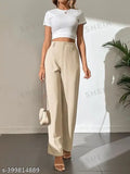 Beige cotton pants with a white cropped top