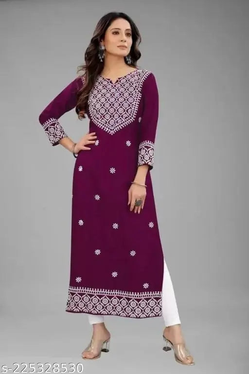 Purple rayon embroidered kurti. Traditional Indian wear for women, featuring three-quarter sleeves and a stunning design. Lightweight, comfortable, and suitable for functions, festivals, parties, or weddings." (125 characters)