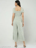 Green polyester smocking print jumpsuit for women, casual and comfortable with short sleeves, ideal for travel and any climate. Made in India