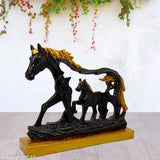Antique black and gold resin horse foal showpiece for home decor, 28x8x21 cm. A beautiful piece of handmade art for good health, fortune, and prosperity. Perfect gift for housewarming, birthdays, or festive occasions. Made in India
