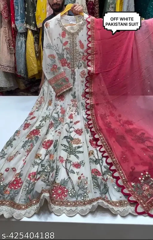 Fashionable designer work suit, red, white, and beige floral embroidery on fabric with long sleeves, pakistan, party wear