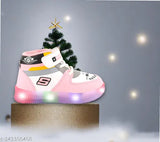 Pink and black glowing casual children's sneakers with Velcro closure