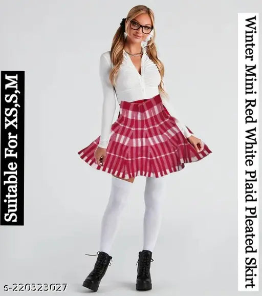 A red and white plaid pleated mini skirt with a sleeveless top on a female mannequin