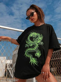 Women's oversized t-shirt with green dragon graphic