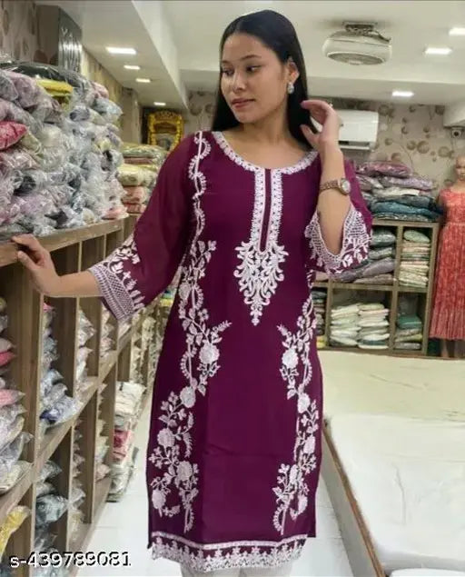 White Georgette Chikankari Ethnic Kurtis for Women, three-quarter sleeves, sizes S-XXL. Indian traditional wear on hanger