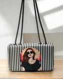 Black and white striped sling bag, featuring a graphic of a woman's face
