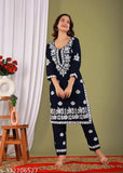 Rayon Chikankari riyon kurta pant set, printed net with three-quarter sleeves, Indian ethnic wear on display