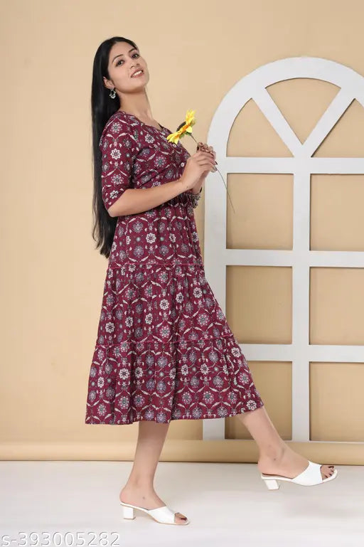 Cotton three-quarter sleeve floral print Anarkali kurta for women, vibrant Indian fashion on mannequin