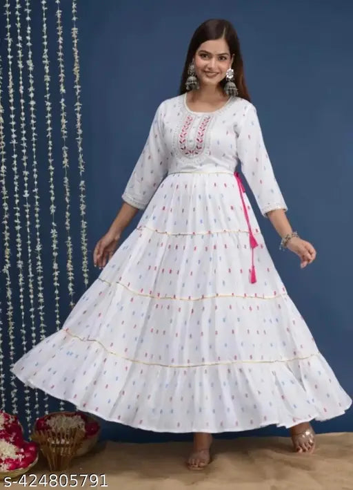 Rayon printed ambroidery kurta with three-quarter sleeves, vibrant Indian design on woman model