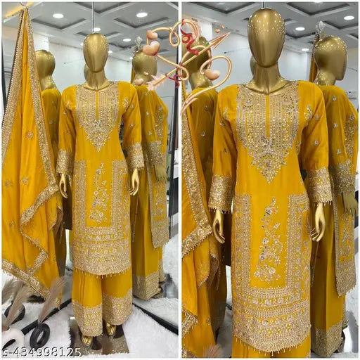 Yellow embroidered designer kurta set with matching pants