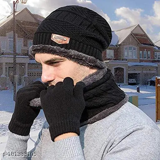 A dark grey knitted beanie, designed with fingerless construction and ribbed cuffs for snug fit