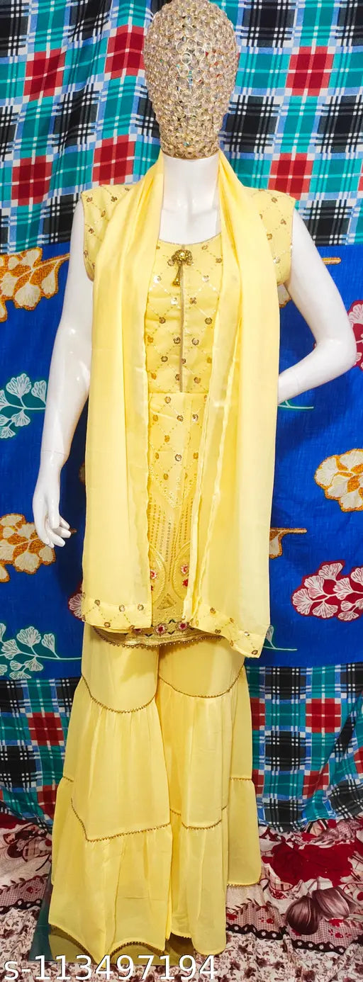 Golden and yellow embroidered traditional two piece frock with matching dupatta, possibly cotton