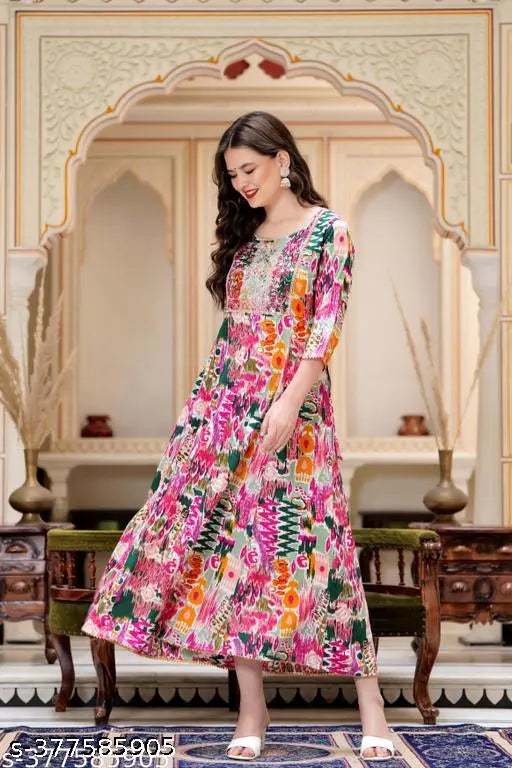 Multi-color rayon kurtas, printed combo with three-quarter sleeves. S: bust 36in, M: bust 38in, L: bust 40in, XL: bust 42in, XXL: bust 44in. Indian ethnic wear on display