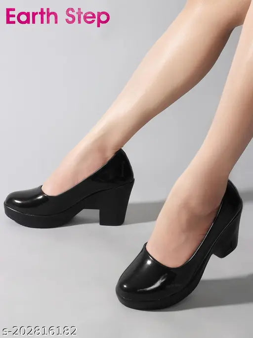 Synthetic leather pointed toe heels, comfortable ballerinas for women. Durable and stylish high heel flats on display