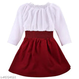 Red and white ruffled children's dress with lace trim