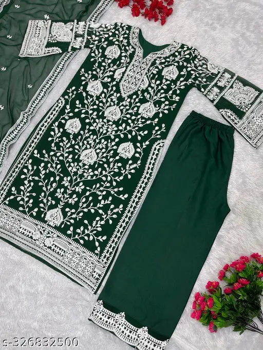 Green georgette top with palazzo suit and dupatta, heavy chine stitch embroidery, soft butter silk bottom, Indian origin