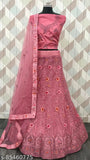 Pink semi-stitched net lehenga choli with detailed embroidery - perfect for festive celebrations, parties, and special events from Gopinath Hand Work. Indian ethnic wear with a modern twist