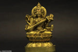 Golden ceramic Saraswati statue, religious idol from India, 5cm x 8cm x 5cm