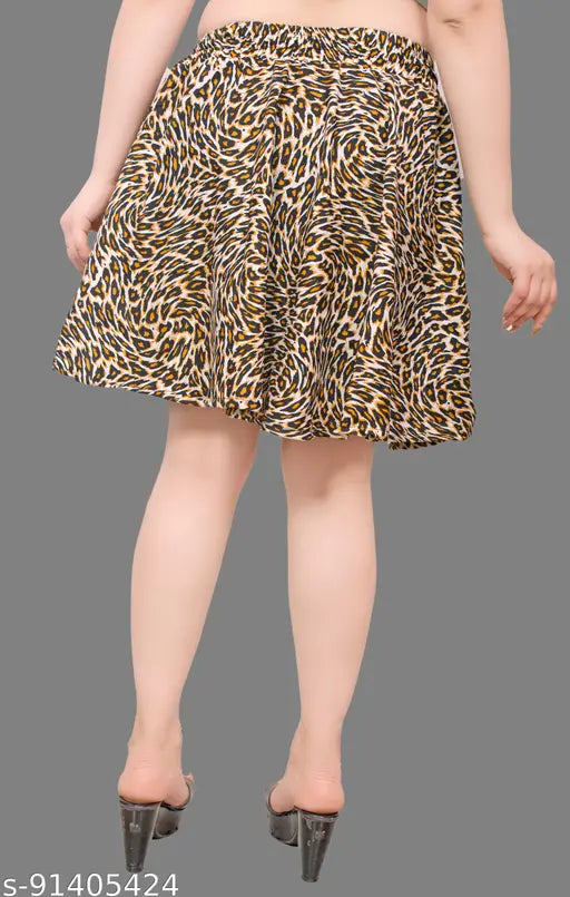 Printed polycrepe mini skirt with high waist and fringe hem