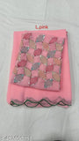Pink and gold sequined saree with a plain blouse