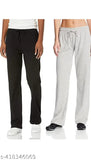 Black and grey men's jogging pants with white sneakers and black top in casual outfit combination