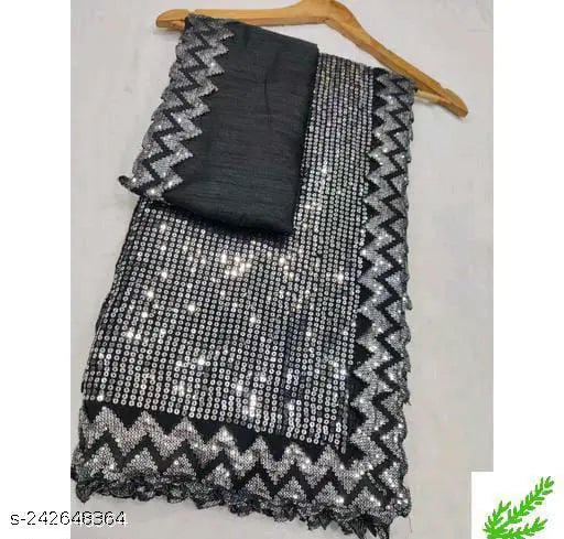 Black sequin saree, with fringe border, fine cutwork and fancy zari pattern